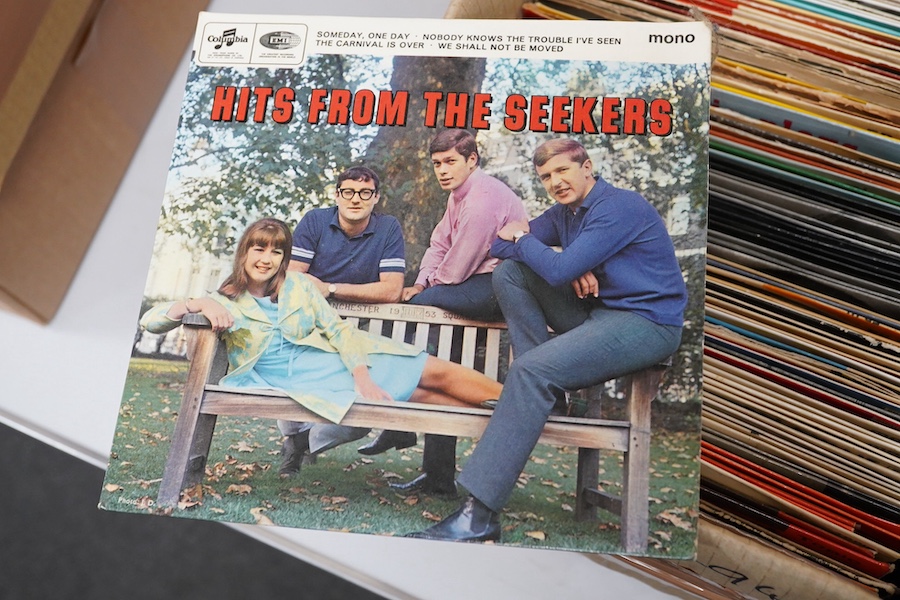 Four boxes of 7 inch singles, on record labels including; Columbia, Pye, Oriole, Stax, Top Rank, Parlophone, etc. artists include; Tom Jones, Otis Redding, The Seekers, Humphrey Lyttelton, Chris Barber, Chuck Berry, Clif